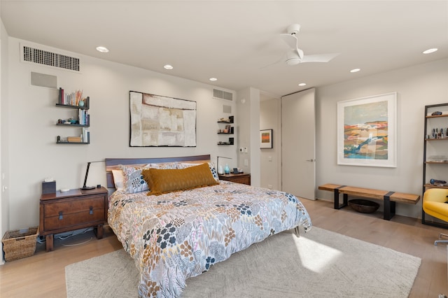 bedroom featuring ceiling fan and light wood-type flooring