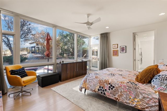 bedroom featuring ceiling fan and light hardwood / wood-style floors