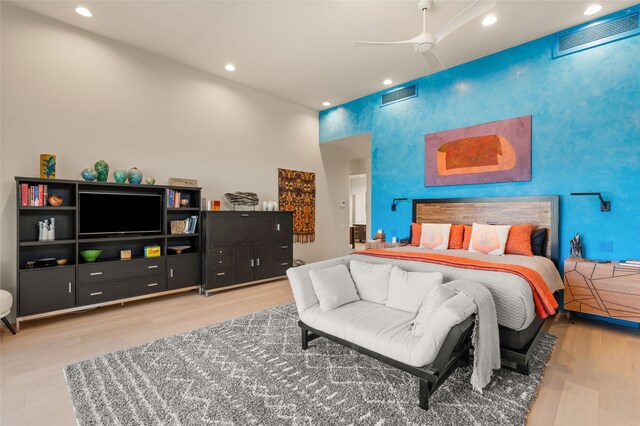 bedroom featuring ceiling fan and wood-type flooring