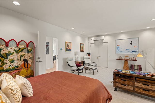 carpeted bedroom featuring a wall mounted air conditioner