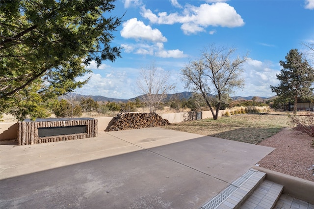 view of patio with a mountain view