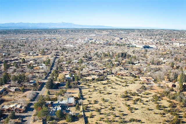 drone / aerial view featuring a mountain view