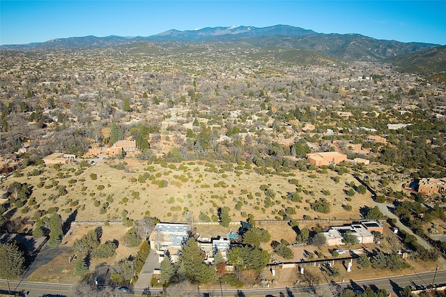 drone / aerial view featuring a mountain view