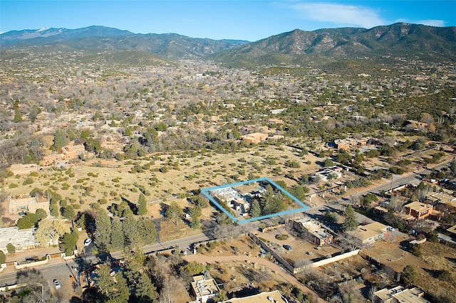 drone / aerial view featuring a mountain view