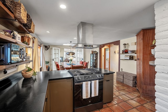 kitchen featuring island range hood, dark countertops, stainless steel range with gas cooktop, open shelves, and recessed lighting