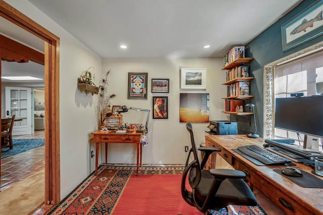 tiled office featuring recessed lighting