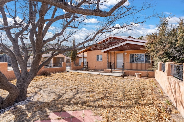 view of front of house with covered porch