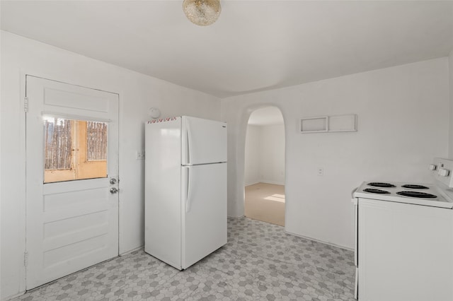 kitchen featuring white appliances