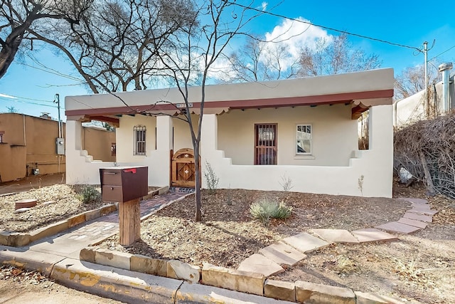 view of adobe home