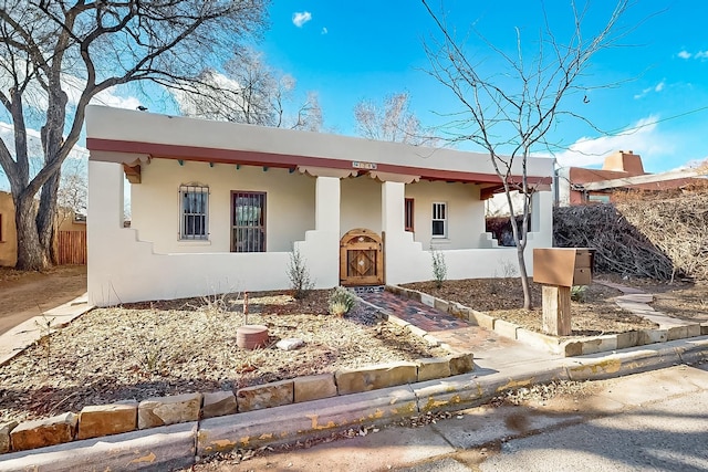 view of adobe home