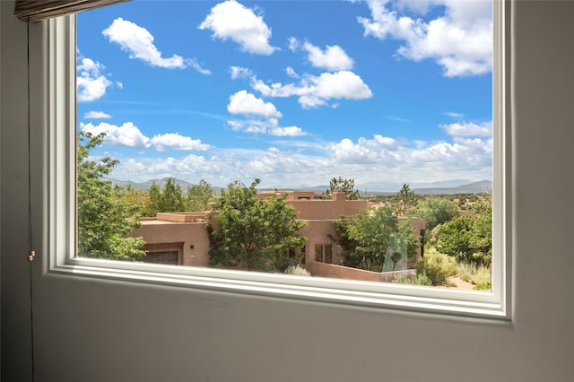 balcony featuring a mountain view