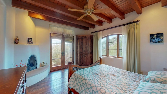 bedroom with dark wood-type flooring, wooden ceiling, french doors, and beamed ceiling