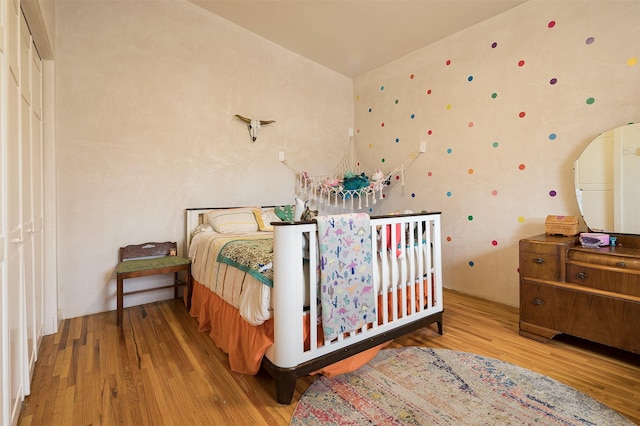 bedroom featuring wood-type flooring