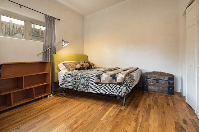 bedroom featuring hardwood / wood-style flooring