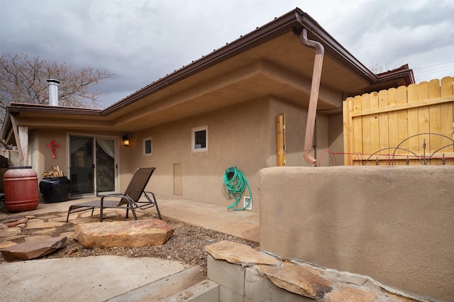 rear view of house with a patio area