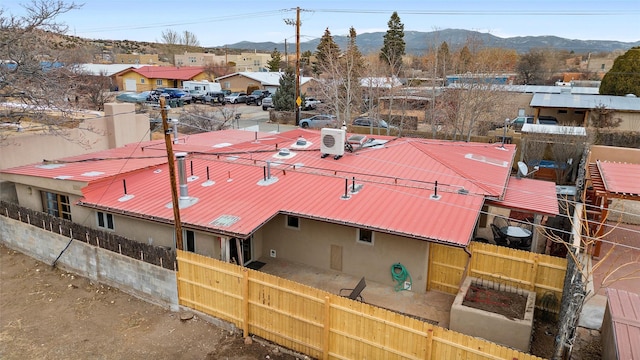 birds eye view of property with a mountain view