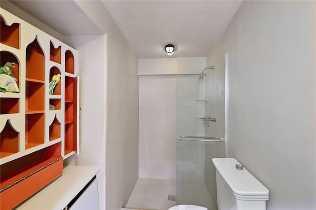 bathroom with an enclosed shower and toilet