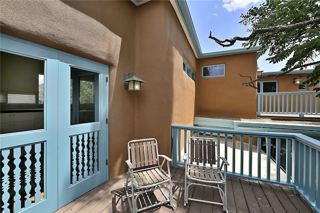 wooden terrace with french doors