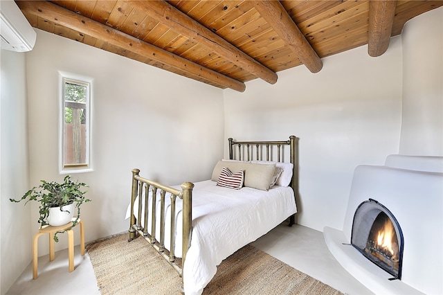 bedroom featuring beam ceiling, wood ceiling, a wall mounted air conditioner, carpet floors, and a fireplace