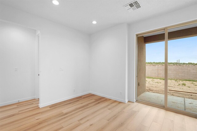 87 Cadena Loop, Los Alamos, NM 87547 - empty room featuring light wood finished floors and recessed lighting
