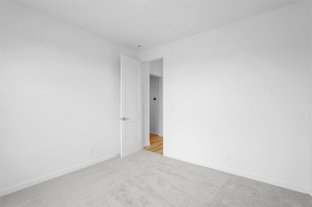 87 Cadena Loop, Los Alamos, NM 87547 - empty room featuring light carpet and baseboards