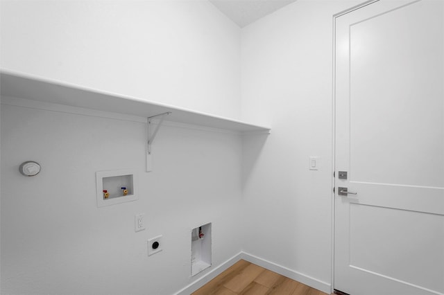 87 Cadena Loop, Los Alamos, NM 87547 - laundry area featuring light wood finished floors, hookup for a washing machine, and hookup for an electric dryer
