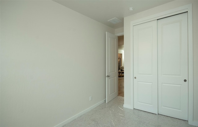 unfurnished bedroom featuring a closet