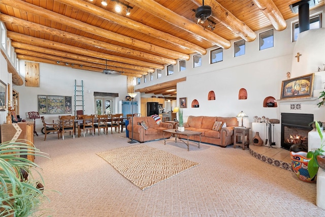 506 Dinkle, Edgewood, NM 87015 - carpeted living room featuring beam ceiling, a high ceiling, and wood ceiling
