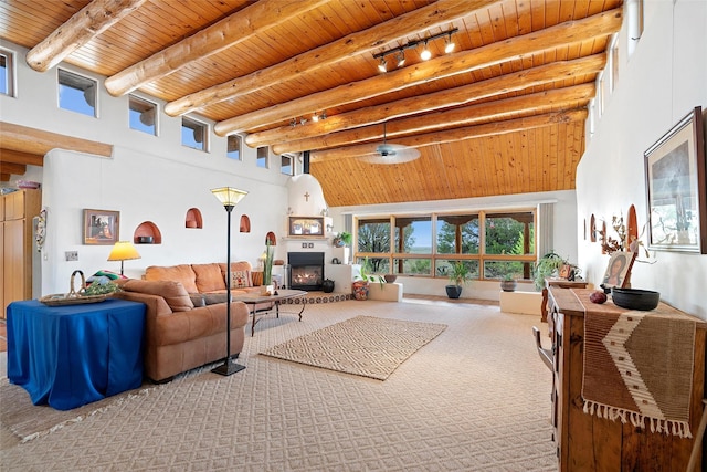 506 Dinkle, Edgewood, NM 87015 - living room with wood ceiling, a towering ceiling, beam ceiling, and carpet floors