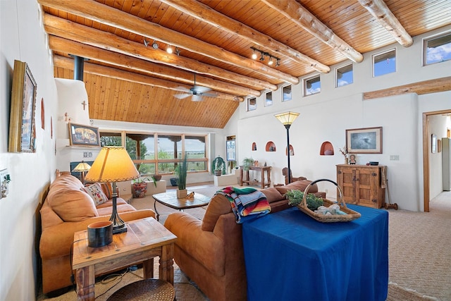 506 Dinkle, Edgewood, NM 87015 - living room with beamed ceiling, carpet flooring, a high ceiling, ceiling fan, and wooden ceiling