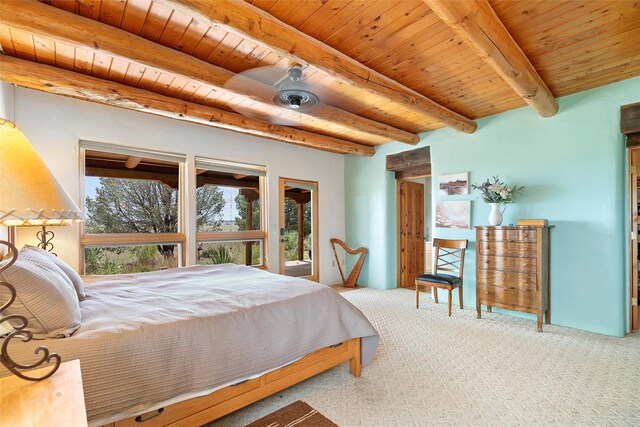 506 Dinkle, Edgewood, NM 87015 - bedroom featuring wooden ceiling, beamed ceiling, and carpet flooring