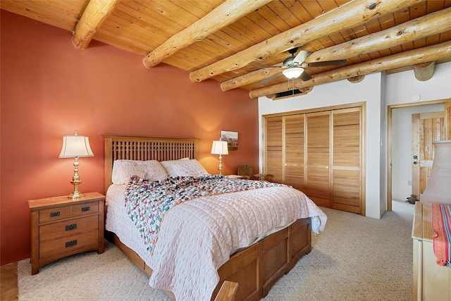 506 Dinkle, Edgewood, NM 87015 - bedroom featuring wood ceiling, ceiling fan, a closet, beamed ceiling, and light colored carpet