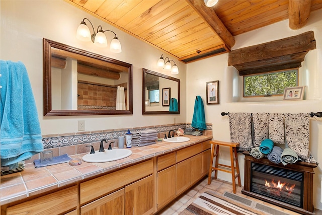 506 Dinkle, Edgewood, NM 87015 - bathroom featuring beamed ceiling, vanity, tile patterned floors, and wood ceiling