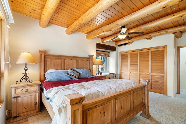 506 Dinkle, Edgewood, NM 87015 - bedroom with light colored carpet, wooden ceiling, a closet, ceiling fan, and beam ceiling