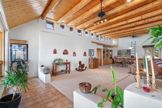 506 Dinkle, Edgewood, NM 87015 - interior space featuring plenty of natural light, beam ceiling, high vaulted ceiling, and wooden ceiling