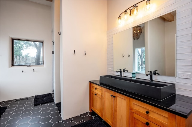 145 Brownell Howland, Santa Fe, NM 87501 - full bath with healthy amount of natural light, double vanity, and tile patterned floors