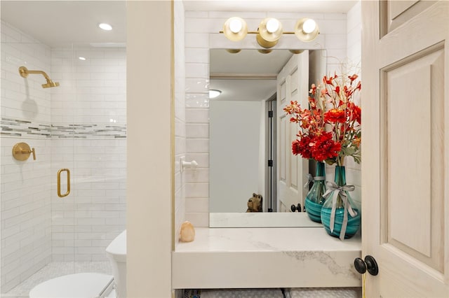 145 Brownell Howland, Santa Fe, NM 87501 - bathroom featuring a shower stall, toilet, and recessed lighting