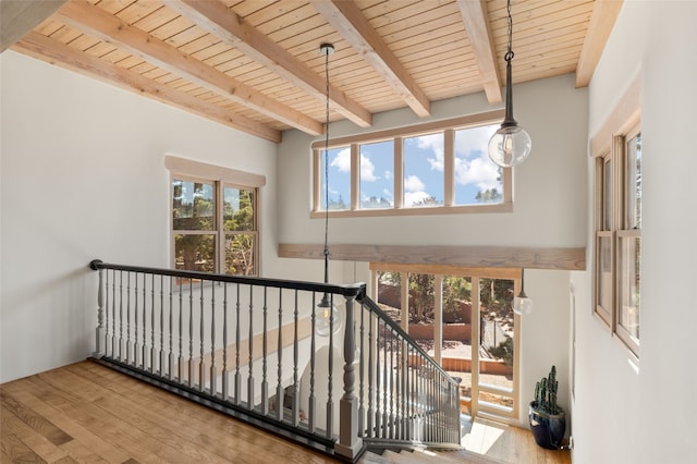145 Brownell Howland, Santa Fe, NM 87501 - stairs with beam ceiling, wood finished floors, and wood ceiling