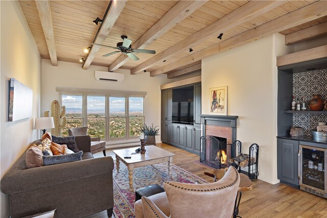 145 Brownell Howland, Santa Fe, NM 87501 - living room with an AC wall unit, wood ceiling, wine cooler, light wood-style flooring, and beam ceiling