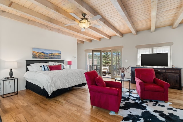 145 Brownell Howland, Santa Fe, NM 87501 - bedroom featuring beam ceiling, light wood-style flooring, access to exterior, and wooden ceiling