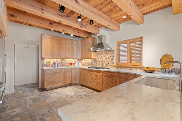 kitchen featuring sink, light brown cabinets, wall chimney exhaust hood, and wood ceiling