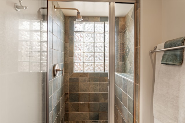 bathroom with an enclosed shower