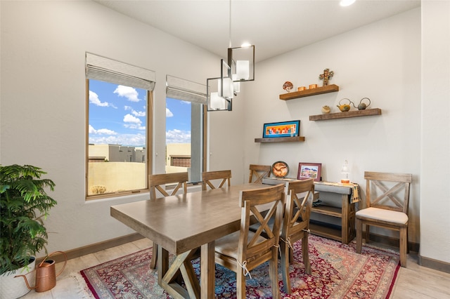 dining room with light wood-type flooring