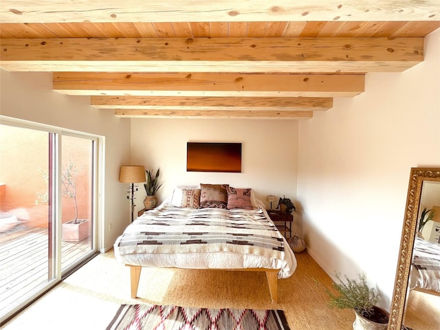 bedroom featuring access to exterior, wooden ceiling, and beam ceiling