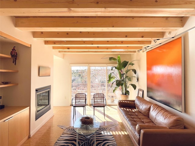 living room with beam ceiling