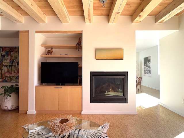 unfurnished living room featuring beam ceiling and wood ceiling