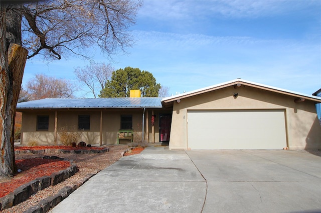 single story home with a garage