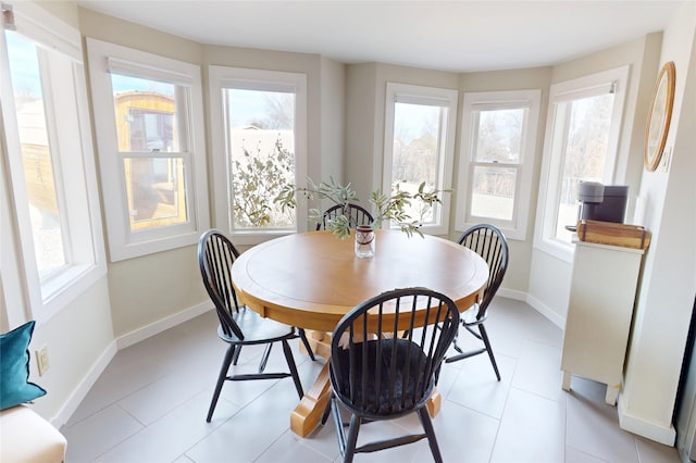 dining room with light tile patterned floors