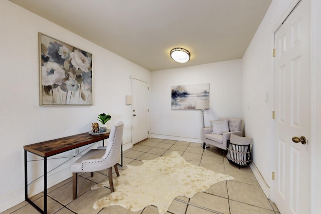 office with light tile patterned floors and baseboards