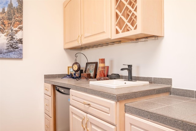 bar featuring indoor bar, a sink, and dishwasher